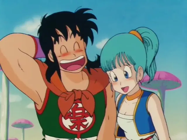 A screen capture of Yamcha and Bulma smiling and blushing from the animated series, Dragon Ball
